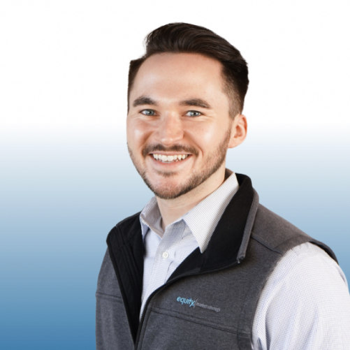 Smiling male Equity team member wearing gray vest, professional headshot